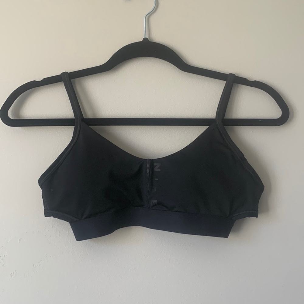 Nike padded sports bra with crossing detail